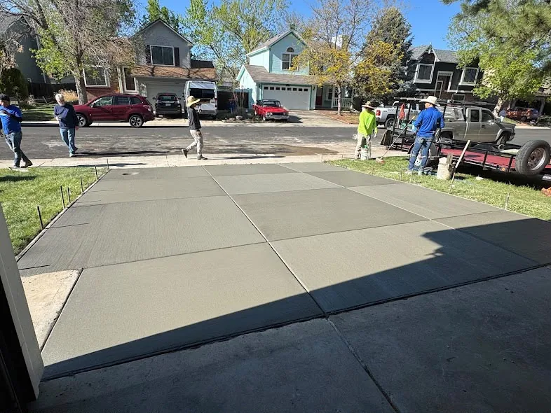 Wide new concrete driveway poured by the Wilson crew
